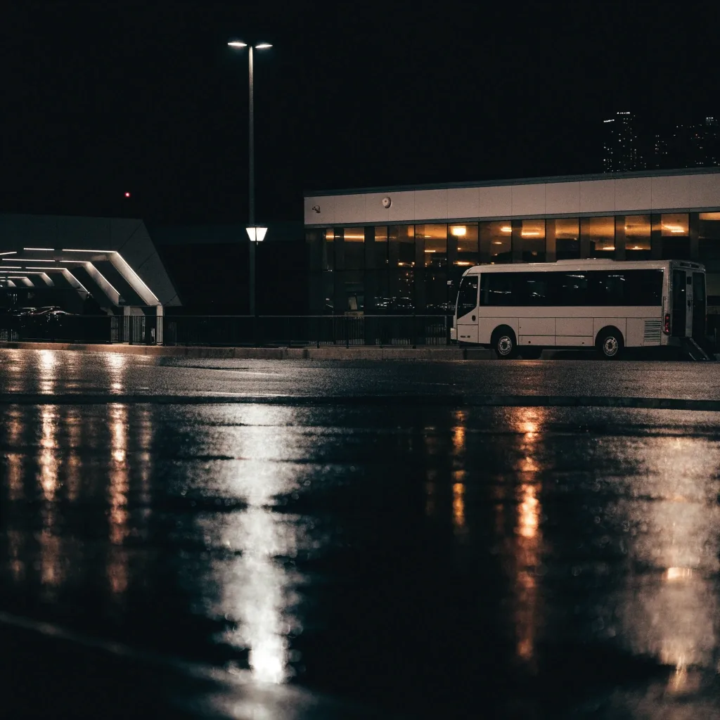 Brisbane Airport terminal forecourt at night in wet weather
